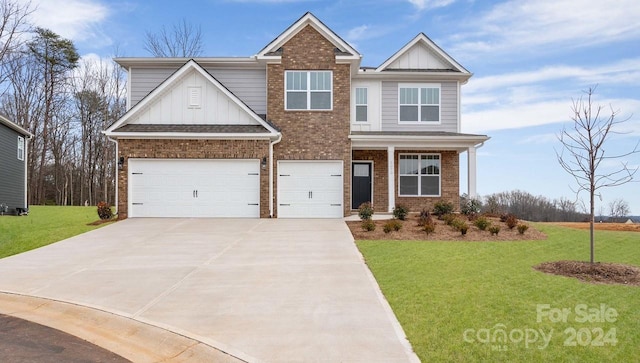 craftsman-style home with a garage and a front lawn