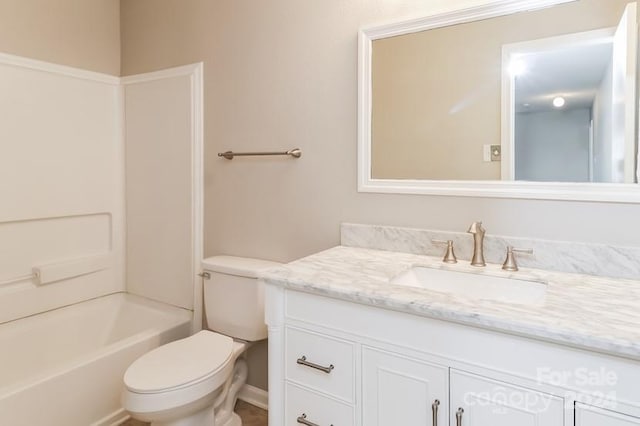 full bathroom featuring toilet, vanity, and shower / washtub combination