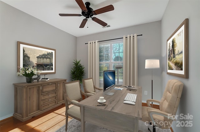 office space featuring ceiling fan and light hardwood / wood-style flooring