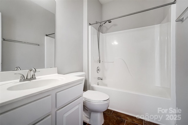 full bathroom featuring toilet, shower / bathing tub combination, tile patterned flooring, and vanity