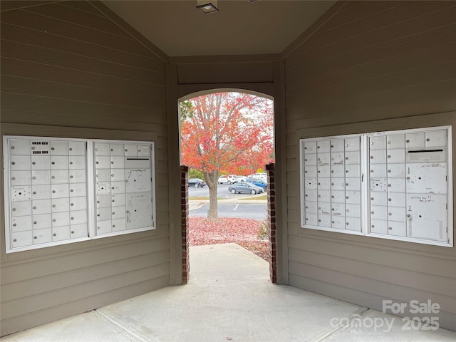 view of property's community with a mail area