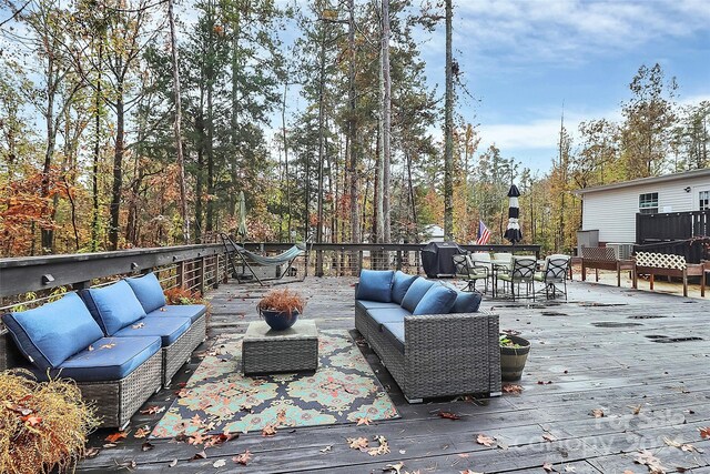 deck with an outdoor living space