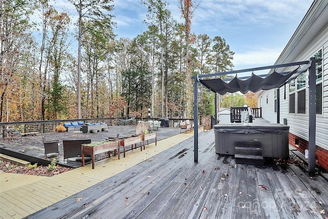 wooden deck featuring a hot tub and an outdoor living space