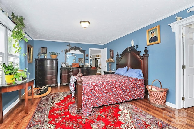 2164 Mission Rd, York, SC 29745 - bedroom featuring wood finished floors, crown molding, and baseboards