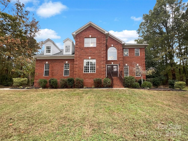 view of front of house with a front lawn