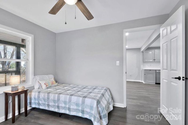 bedroom featuring ceiling fan and dark wood-type flooring