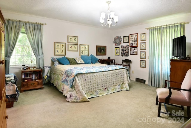 carpeted bedroom with crown molding, a chandelier, and a textured ceiling