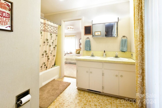 bathroom featuring vanity, shower / tub combo, and ornamental molding