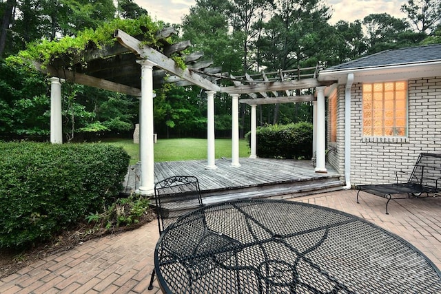 view of patio featuring a pergola and a deck