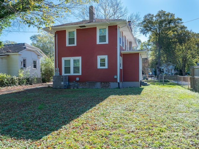 1411 Lineberger Ave, Gastonia, NC 28052 - rear view of house featuring a chimney and central AC unit