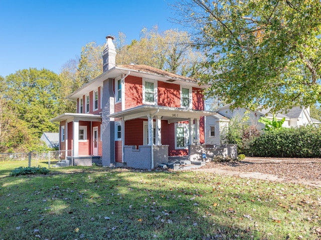 view of front of home featuring a front lawn and a porch