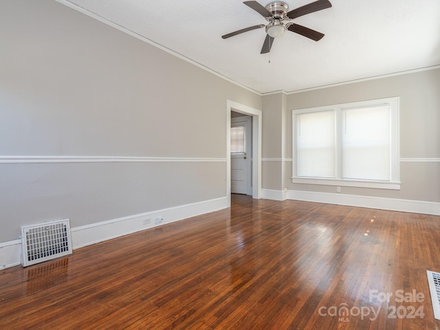 1411 Lineberger Ave, Gastonia, NC 28052 - spare room featuring ornamental molding, a ceiling fan, wood finished floors, and baseboards
