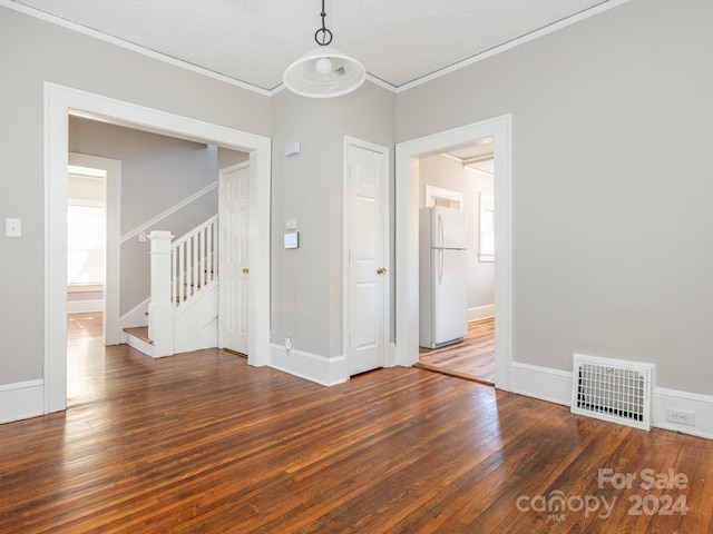 1411 Lineberger Ave, Gastonia, NC 28052 - unfurnished room featuring wood finished floors, ornamental molding, stairs, baseboards, and a textured ceiling