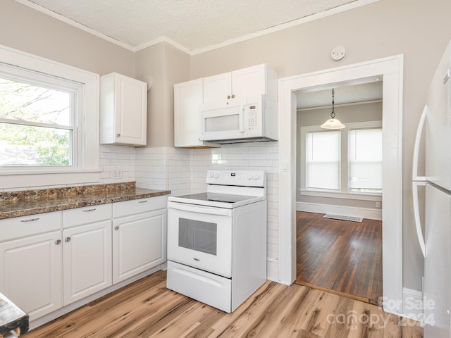 1411 Lineberger Ave, Gastonia, NC 28052 - kitchen with white appliances, white cabinets, a textured ceiling, crown molding, and light wood-style flooring
