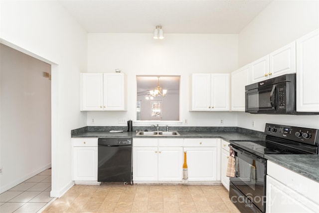 kitchen featuring sink, light tile patterned floors, white cabinetry, a notable chandelier, and black appliances