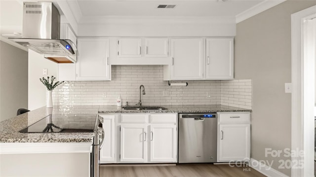 kitchen with sink, exhaust hood, dishwasher, dark stone counters, and white cabinets