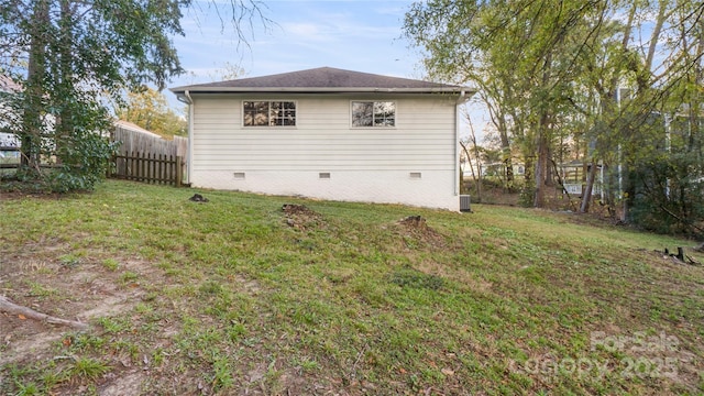 view of home's exterior featuring a yard