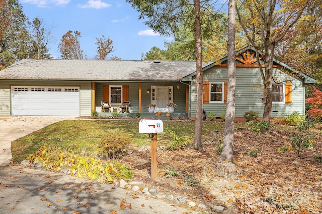 ranch-style house featuring a garage and a porch