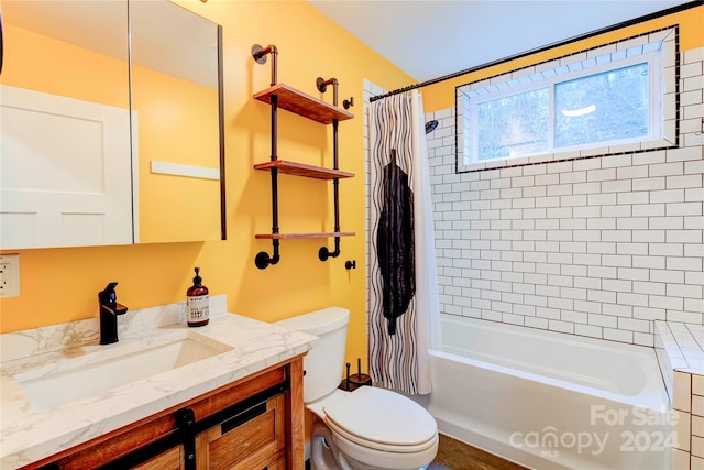 full bathroom with shower / tub combo with curtain, vanity, and toilet