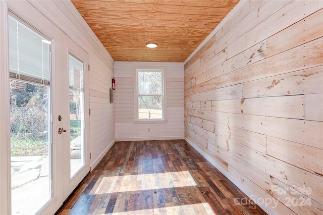 unfurnished sunroom featuring wooden ceiling