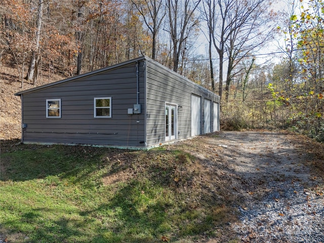 view of property exterior with a garage