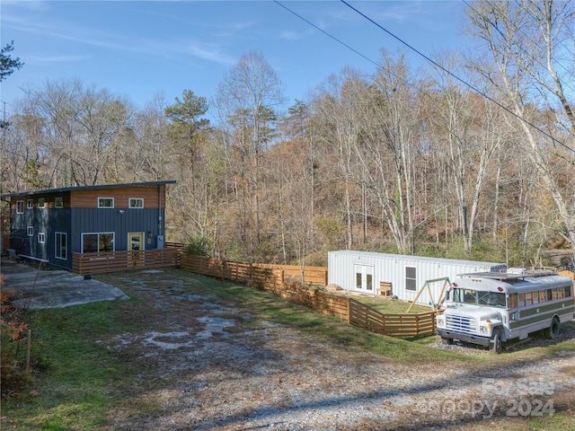 view of front of property featuring a patio