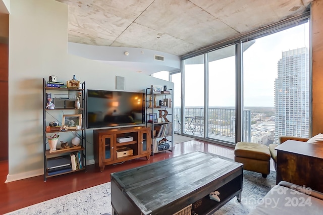 living room featuring a wall of windows