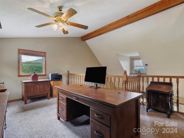 office space with ceiling fan, a textured ceiling, light carpet, and lofted ceiling with beams