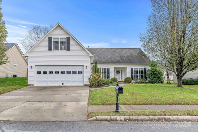 front of property featuring a front yard and a garage