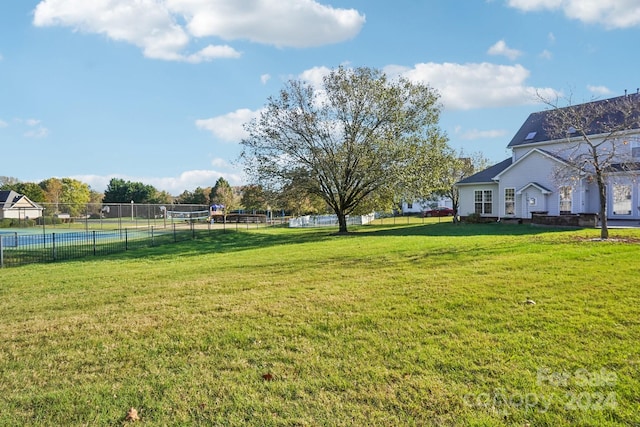 view of yard with a rural view