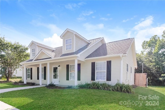 714 Knots Lndg, Clover, SC 29710 - cape cod home with a front yard, covered porch, and roof with shingles