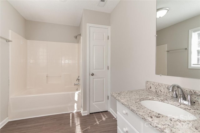 714 Knots Lndg, Clover, SC 29710 - bathroom featuring wood finished floors, shower / tub combination, baseboards, and vanity