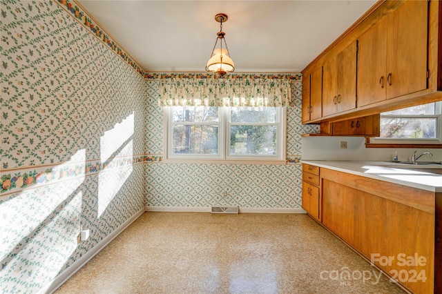 kitchen featuring sink and pendant lighting