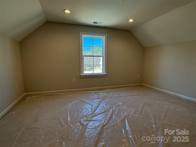 bonus room featuring vaulted ceiling, recessed lighting, visible vents, and baseboards