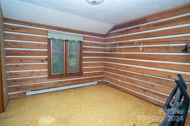 unfurnished room featuring a baseboard radiator and vaulted ceiling