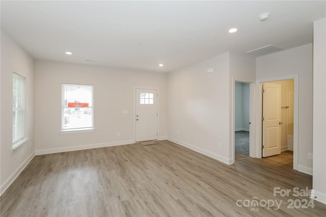 interior space with light hardwood / wood-style flooring