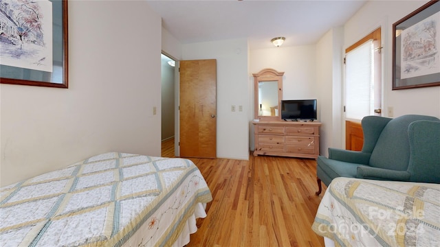 bedroom featuring light hardwood / wood-style floors