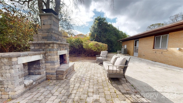 12 Moland Dr, Etowah, NC 28729 - view of patio featuring an outdoor living space with a fireplace and cooling unit