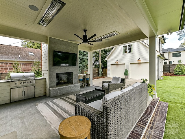 view of patio / terrace featuring ceiling fan, area for grilling, an outdoor living space with a fireplace, and grilling area