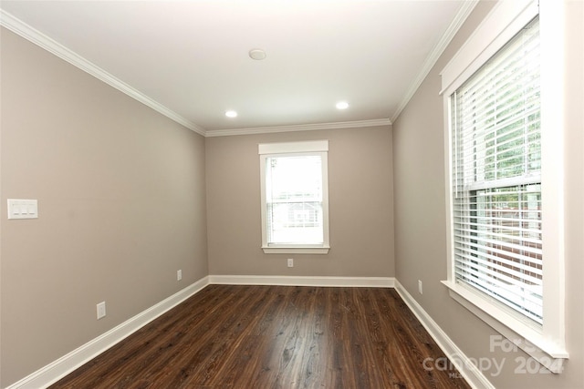 unfurnished room featuring dark hardwood / wood-style flooring and ornamental molding