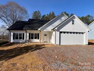 view of front of house featuring driveway and an attached garage