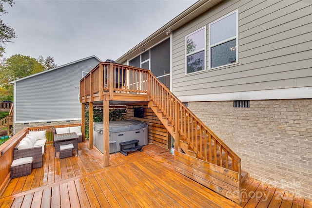 deck with a hot tub