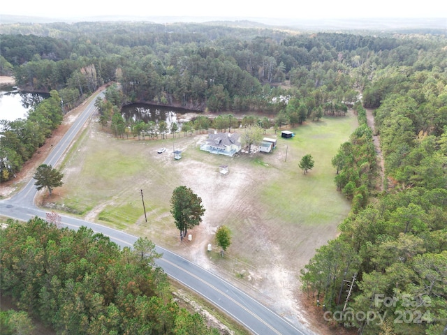 2034 Haileys Ferry Rd, Lilesville, NC 28091 - aerial overview of property's location with a forest and a large body of water
