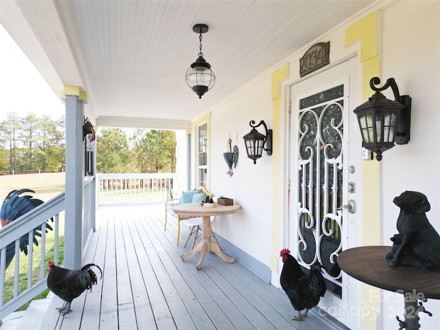 wooden deck featuring a porch