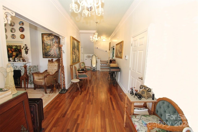 corridor featuring a chandelier, dark hardwood / wood-style flooring, and crown molding