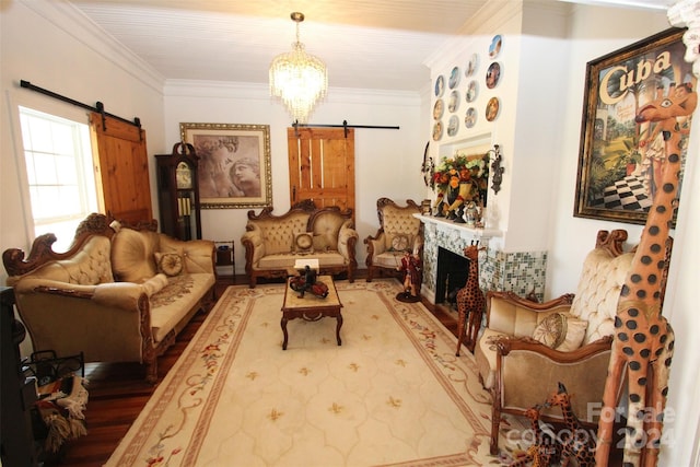 2034 Haileys Ferry Rd, Lilesville, NC 28091 - living area with a barn door, wood finished floors, a chandelier, crown molding, and a high end fireplace