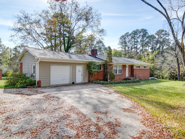 single story home featuring a garage and a front lawn