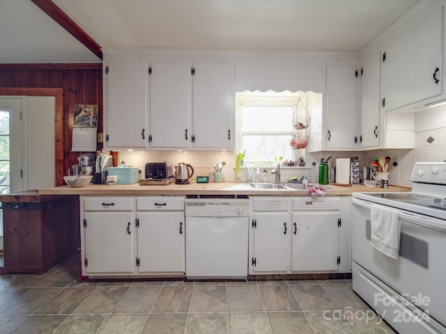 kitchen featuring white cabinetry and white appliances