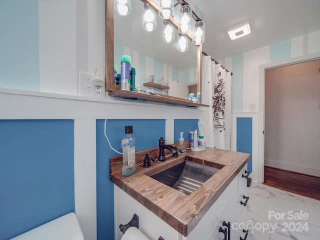 kitchen with white cabinets and sink