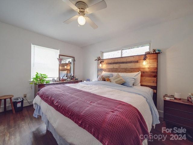 bedroom featuring ceiling fan and dark hardwood / wood-style floors